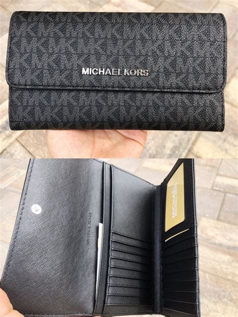 lowest price black mk wallet.